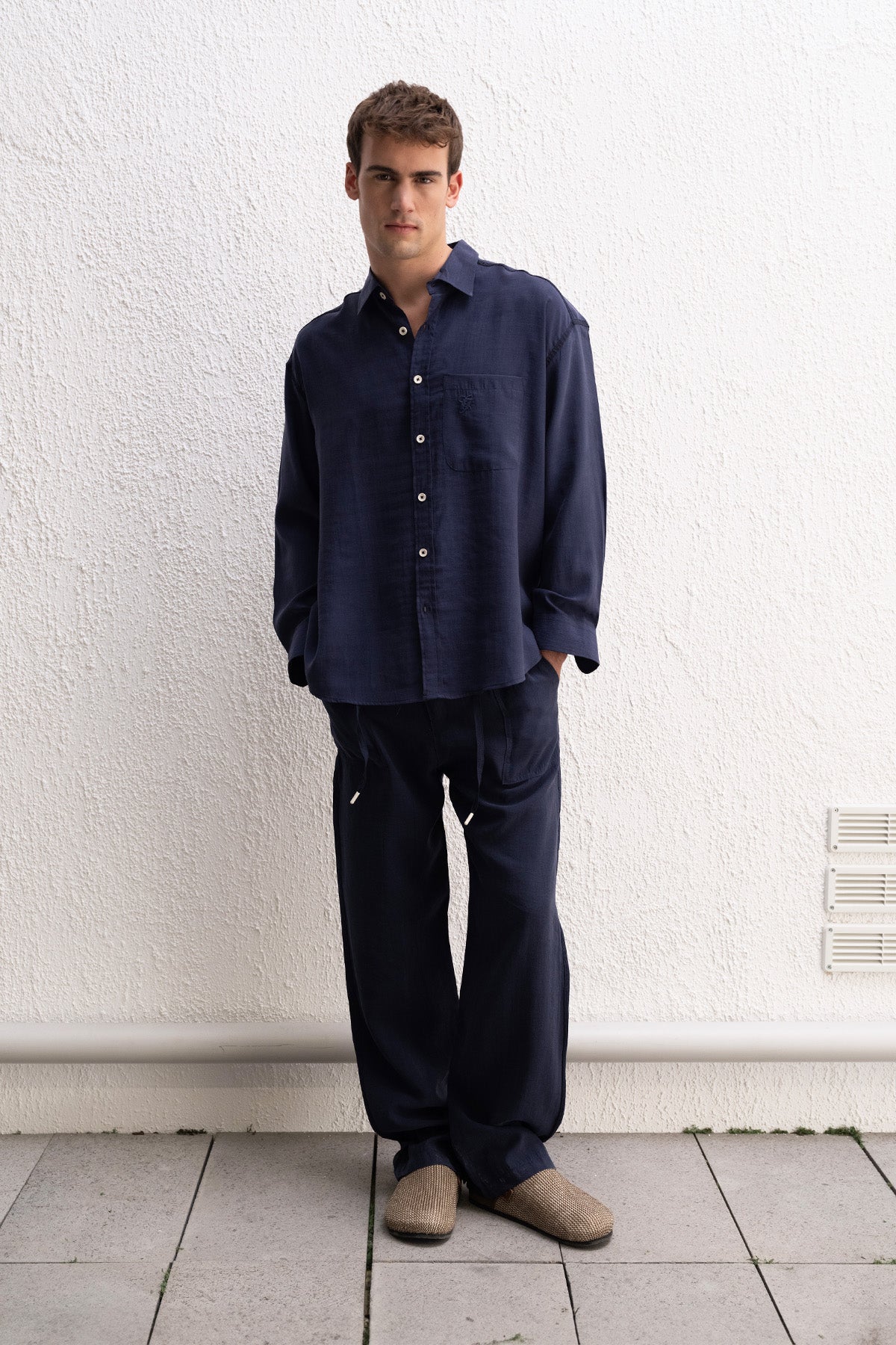 DRAPED JOGGER NAVY TROUSERS