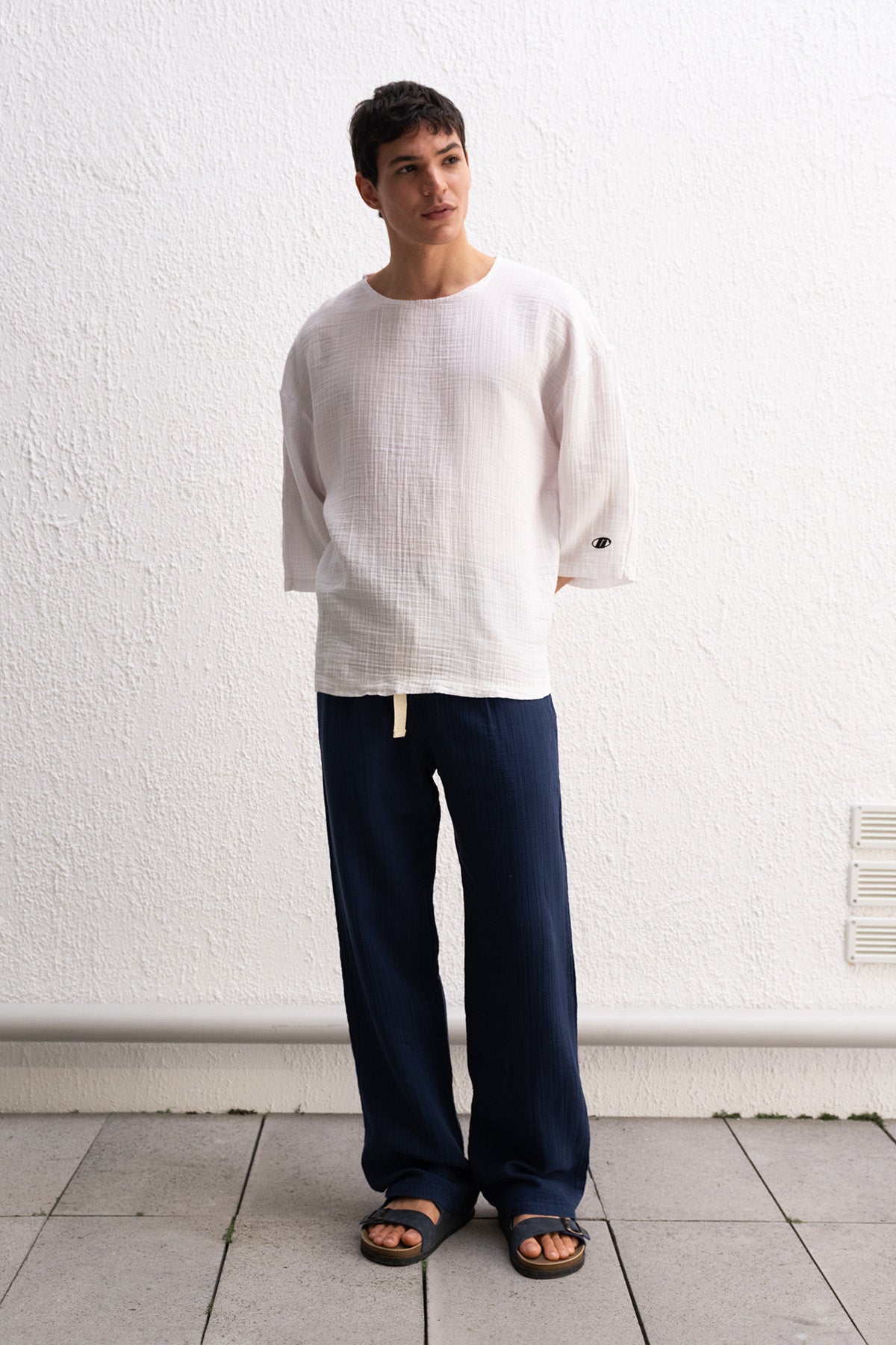 NAVY TROUSERS WITH DRAPED LACE DETAIL