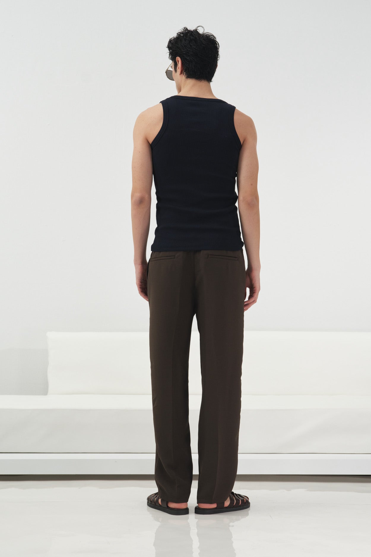 TEXTURED BROWN PLEATED TROUSERS