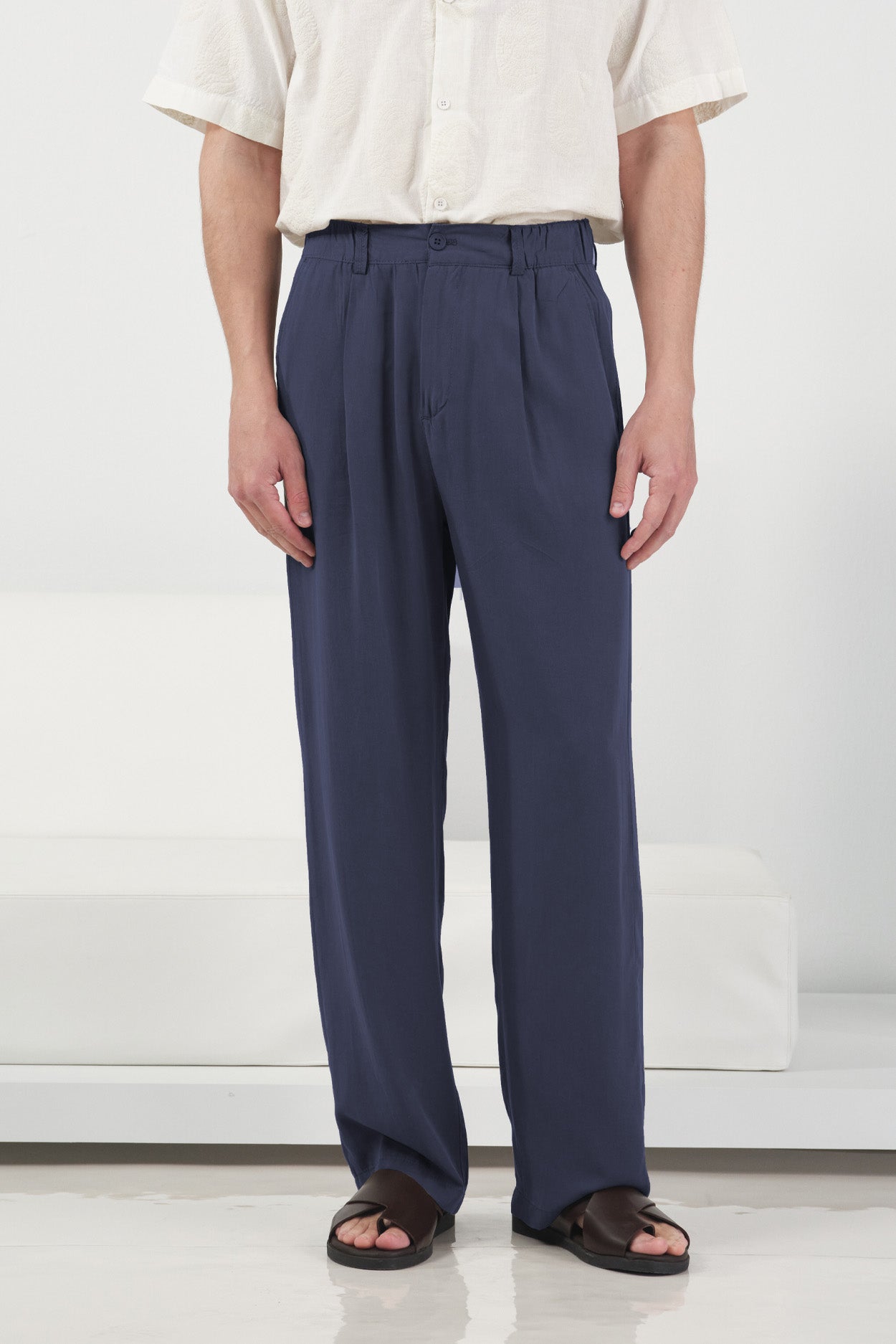 NAVY TENCEL PLEATED DRAPEY TROUSERS