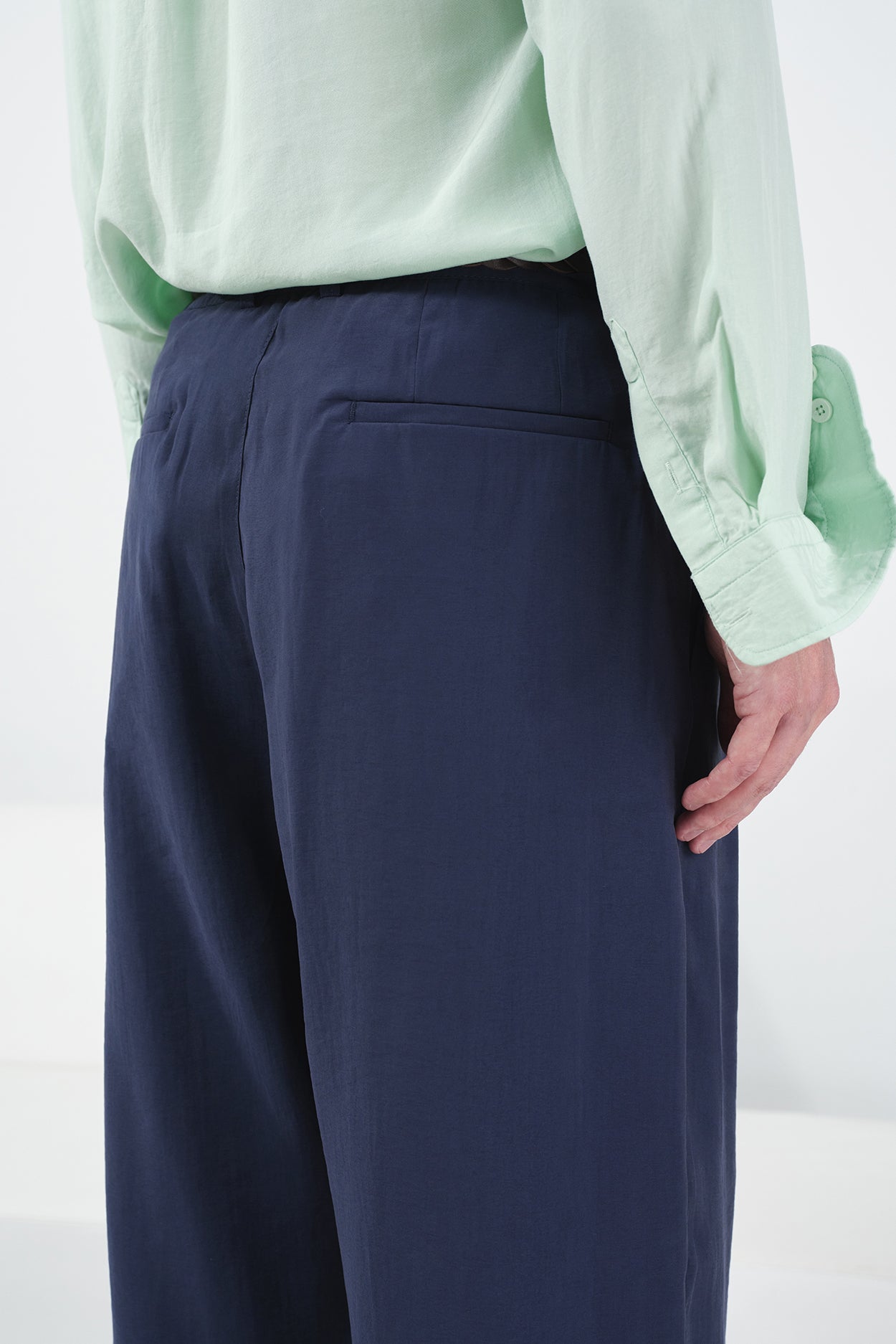 DOUBLE PLEATED DRAPED NAVY MODAL TROUSERS