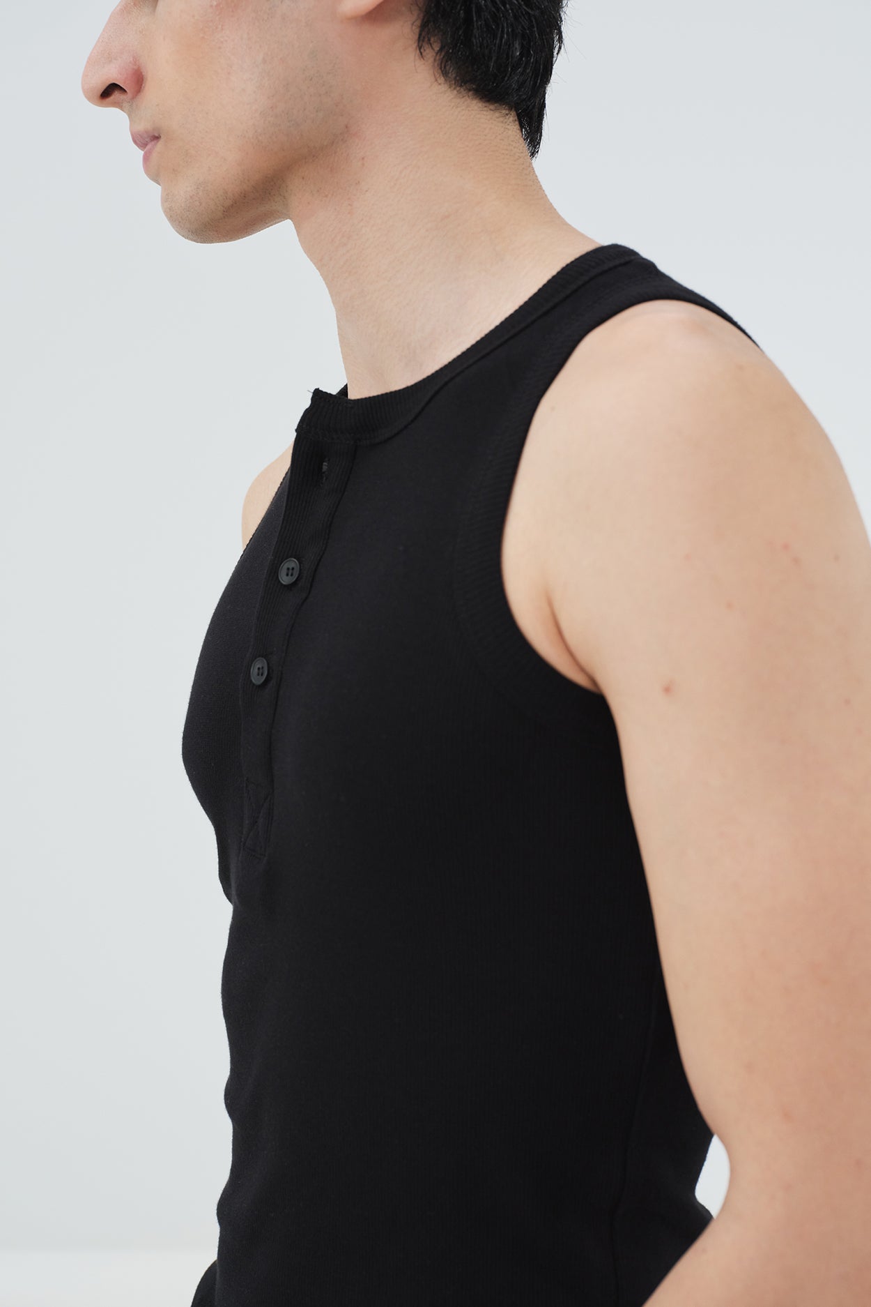 BLACK SLEEVELESS T-SHIRT WITH HALF PLACKET