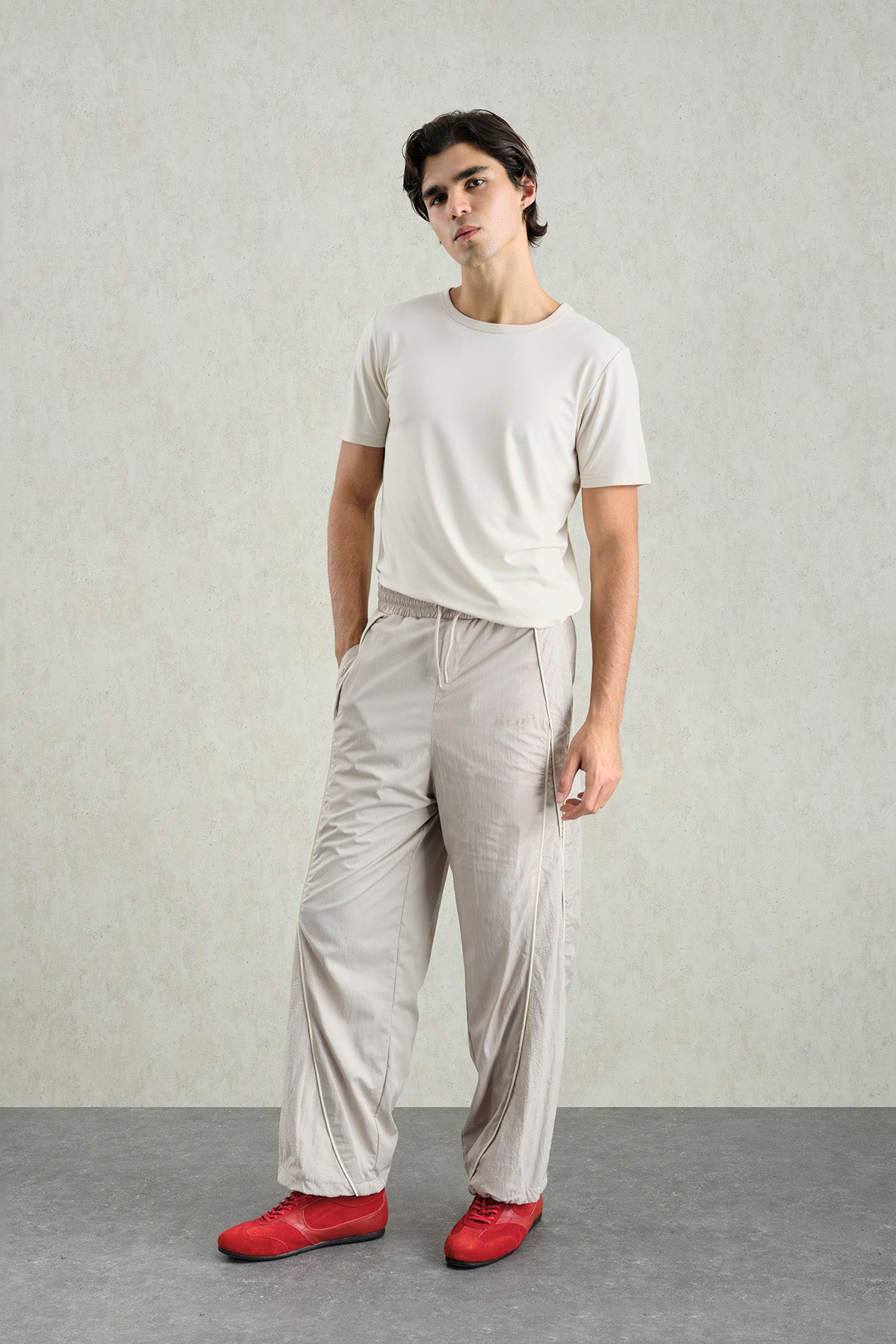 FLOCK PATTERNED BEIGE JOGGER PANTS