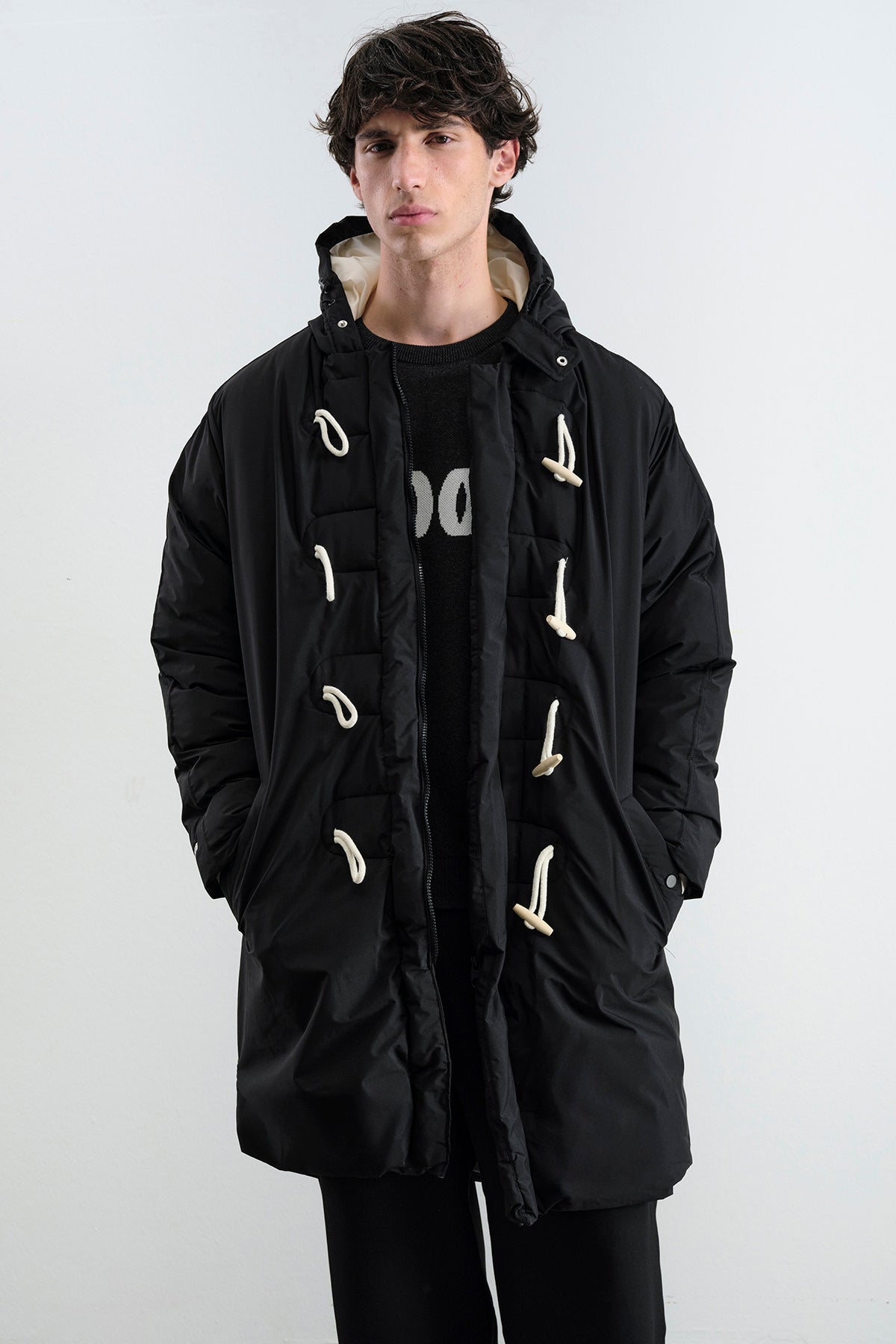LONG HOODED PUFFER JACKET IN BLACK