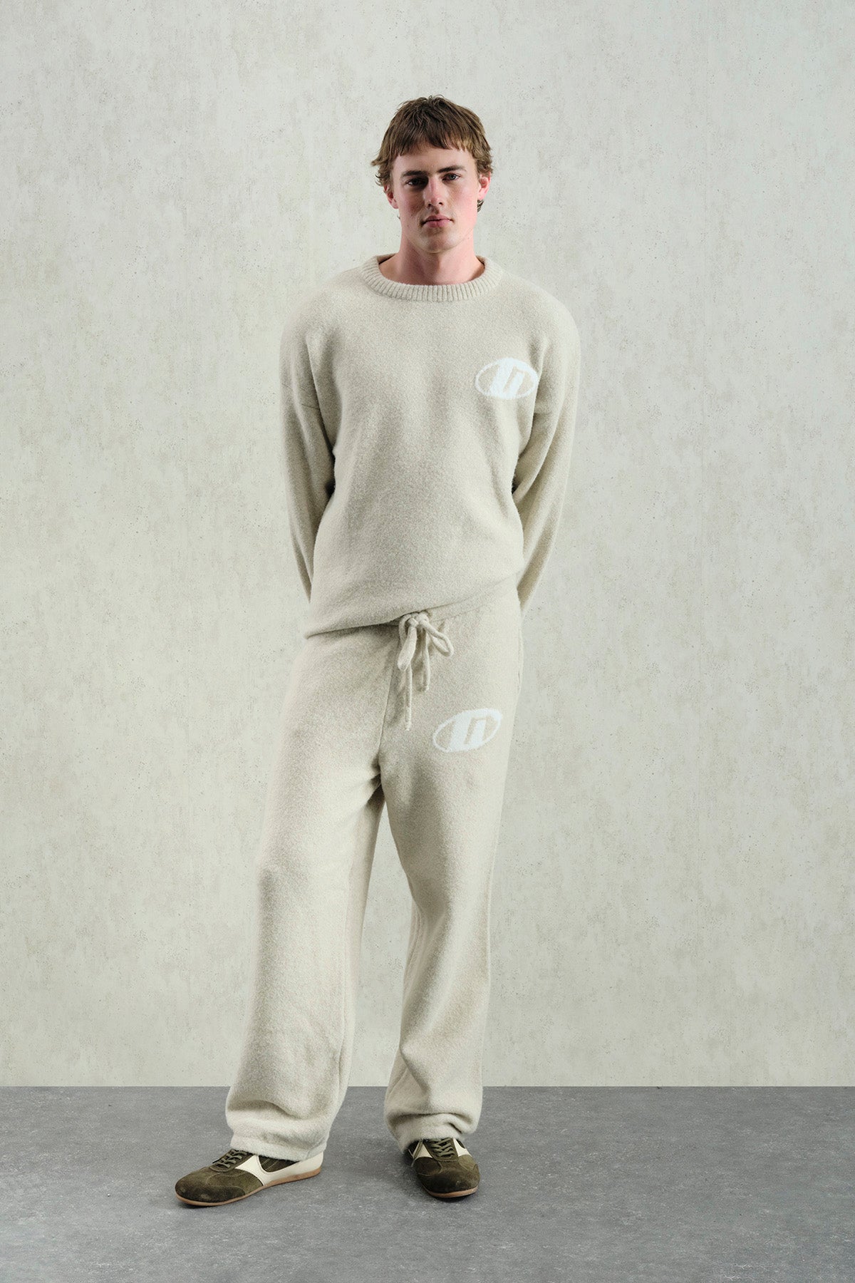 SOFT-TEXTURED KNITTED BEIGE TROUSERS